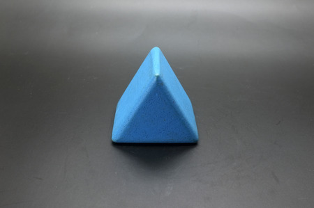 Toy wooden blue triangle blocksの写真素材
