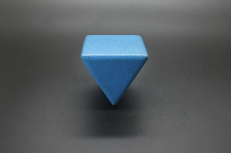 Toy wooden blue triangle blocksの写真素材