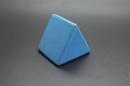 Toy wooden blue triangle blocksの写真素材