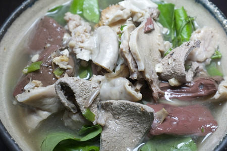 Thai Style Clear Soup with Congealed pork blood ,  minced pork and pork organの写真素材