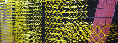 Thai wicker woven  wall  made from plastic  rope  , Concept  Decoration event idea