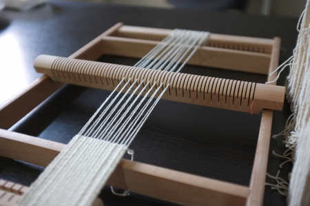 Thai textile , Workshop weaving loom , Silk cotton on the loom , concept creative , craftの写真素材