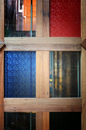 Mixed color door glass of Thai house style, Thai vintage styleの写真素材