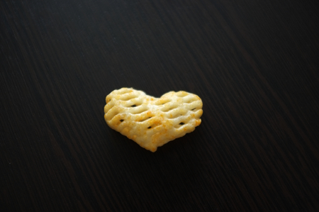 Heart shaped snack isolated on black background , Concept Valentine day , loveの写真素材