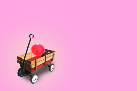 Heart in little red wood wagon with free space for text input, logo, etc. Concept Valentine DAY , I love you .の写真素材