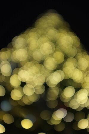 Blur light celebration on christmas tree with bokeh background