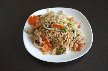 Thai style street food , Instant noodle spicy salad with minced pork and vegetables  