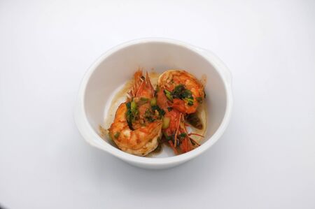 Fried shrimp with garlic  on white backgroundの写真素材