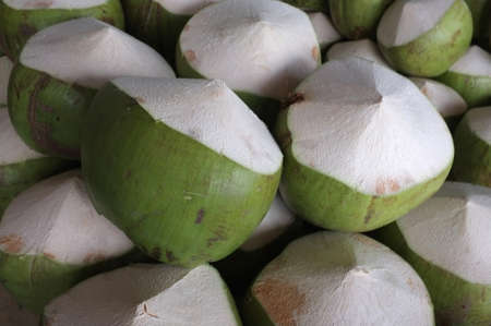 Fresh coconuts in the market , Thai foodの写真素材