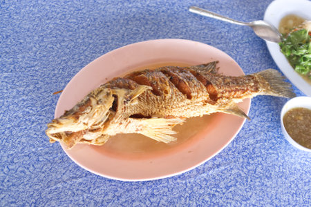 Snapper topped with sauce , Thai seafoodの写真素材