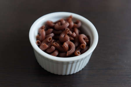 Raw Organic Dry Penne Pasta Ready to Cook . Organic foodの写真素材