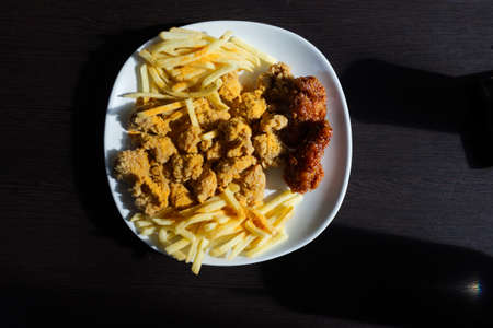 fried chicken with french fries and nuggets meal . Concept junk foodの写真素材