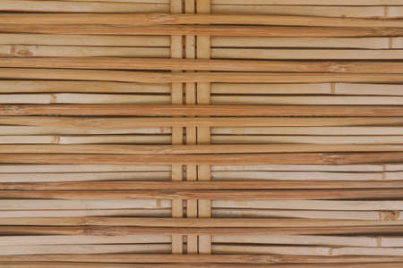 Old brown tone bamboo plank fence texture .