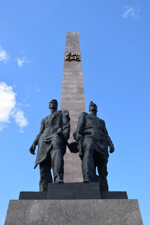 The monument to the defenders of Leningrad - Stella 1941-1945 in St. Petersburg Victory Day on May 9 bright Sunny day against a blue skyのeditorial素材