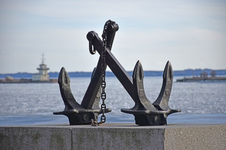A monument to the old sea anchors on the waterfront of Kronstadtの写真素材