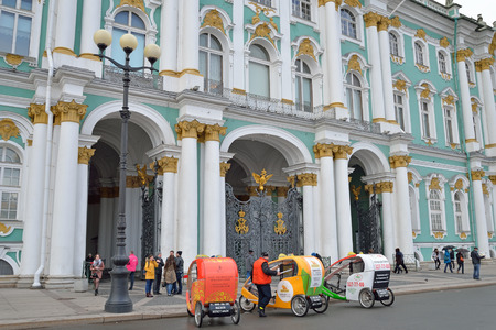 ST.PETERSBURG, RUSSIA - APRIL 28, 2016: Bicycle taxi on the Palace square in Saint-Petersburgのeditorial素材