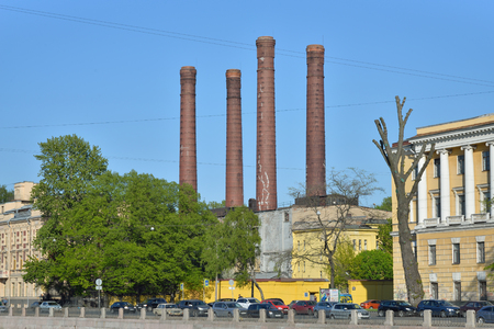 Four brick chimneys of boiler house on the Fontanka embankment  in Saint-Petersburgの写真素材
