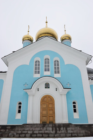 The entrance to blue stone Orthodox Church in the monastery nikandrova Pustyn in the Pskov regionの写真素材