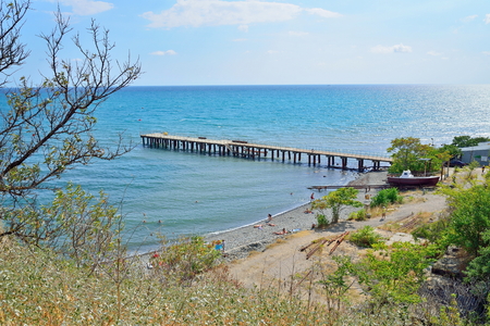 The beach and pier in the village Resort. Crimeaの写真素材