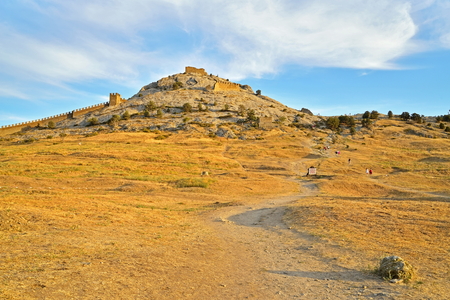 Genoese fortress in Sudak in the rays of the setting sun. Crimeaの写真素材