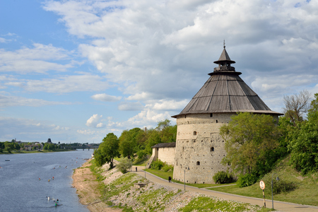PSKOV, RUSSIA - MAY 17, 2016: The river view is Great and the Tower of the fortress wall of the Church of Intercession and Nativity from a Breakの写真素材
