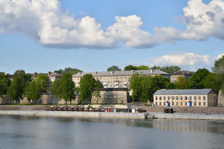 PSKOV, RUSSIA - MAY 17, 2016: Embankment of Naval glory and an outdoor café on the river Greatの写真素材