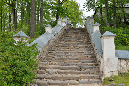 A stone staircase in the Uspensky Svyatogorsky monastery, Pushkinskaya Street the city Pushkinskiye Goryの写真素材