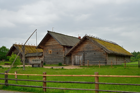 Old Russian log hut in Pushkin Mikhailovskoe summer cloudy dayの写真素材