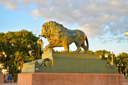 Sculpture of a lion on the Admiralty embankment in Saint-Petersburg in Saint-Petersburg.の写真素材