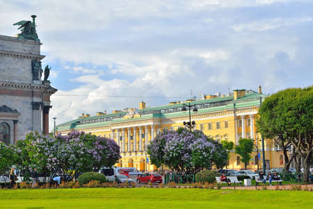 Hotel 4 seasons on St. Isaac's square among the blooming lilacs in Saint-Petersburgの写真素材