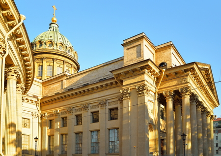 The dome and colonnade of the Kazan Cathedral in sunlight against the skyの写真素材