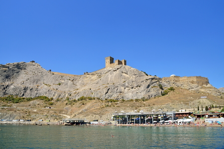 View of the Genoese fortress in Sudak town, sea. Crimeaの写真素材