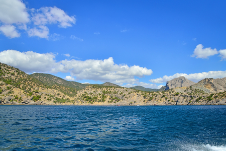 View from boat at sea on the coast in the village of Novy Svet. Crimea.. Sudakの写真素材