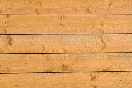 Old plank wood yellow wall.の写真素材
