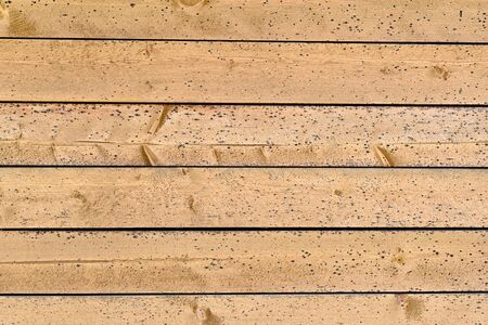Old plank wood yellow wall.の写真素材