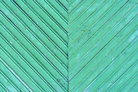 Background. Bright green wooden plank wall.の写真素材