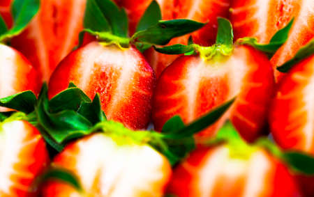 Background with Beautiful and Juicy Strawberries. Fresh Juicy Strawberries with Leaves. Summer Berries Background.の写真素材