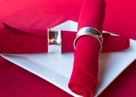 Red Napkins on a White Plateの写真素材