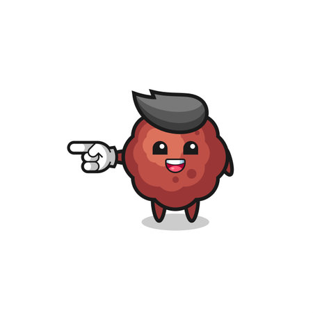 meatball cartoon with pointing left gesture , cute designのイラスト素材
