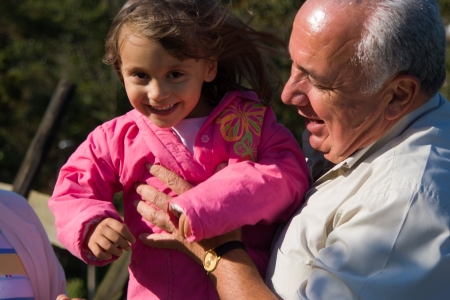 Happy Grandfather and grandchild, Enjoying At The Parkの写真素材