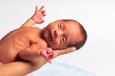 Portrait OF Mom Playing With Newbornの写真素材