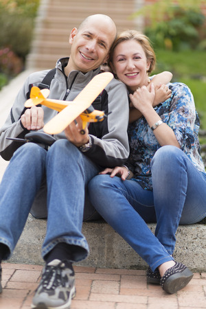 Happy Couple Enjoying At Home Outside During  A Summer Dayの写真素材