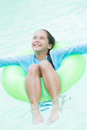 Happy Girl Enjoying in Water at Water Parkの写真素材