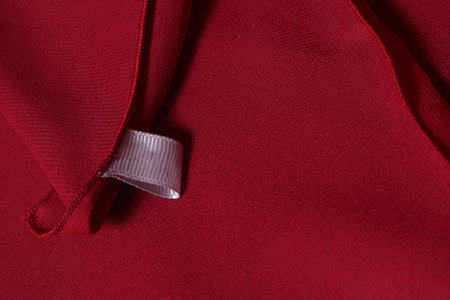 Piece of luxurious red satin fabric suitable for a textured background. Selectiv Focus. Abstract.の写真素材