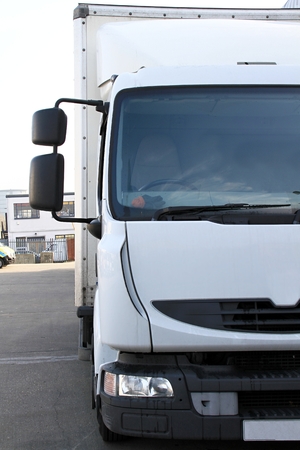 lorries parked up outside a company's car parking areaの写真素材