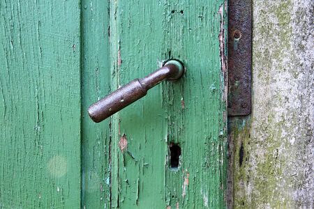 old door with metal handles with no key and no people stock photography stock photo