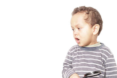 boy with magnifying glass ready to explore stock photo
