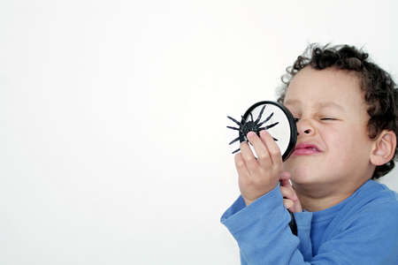 boy with magnifying glass ready to explore stock photoの写真素材