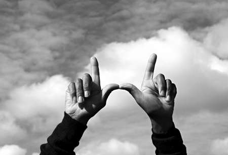 hand gesture showing willingness stock photo