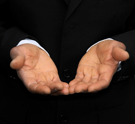 man praying to god with hands together Caribbean man praying with black background stock photos stock photoの写真素材